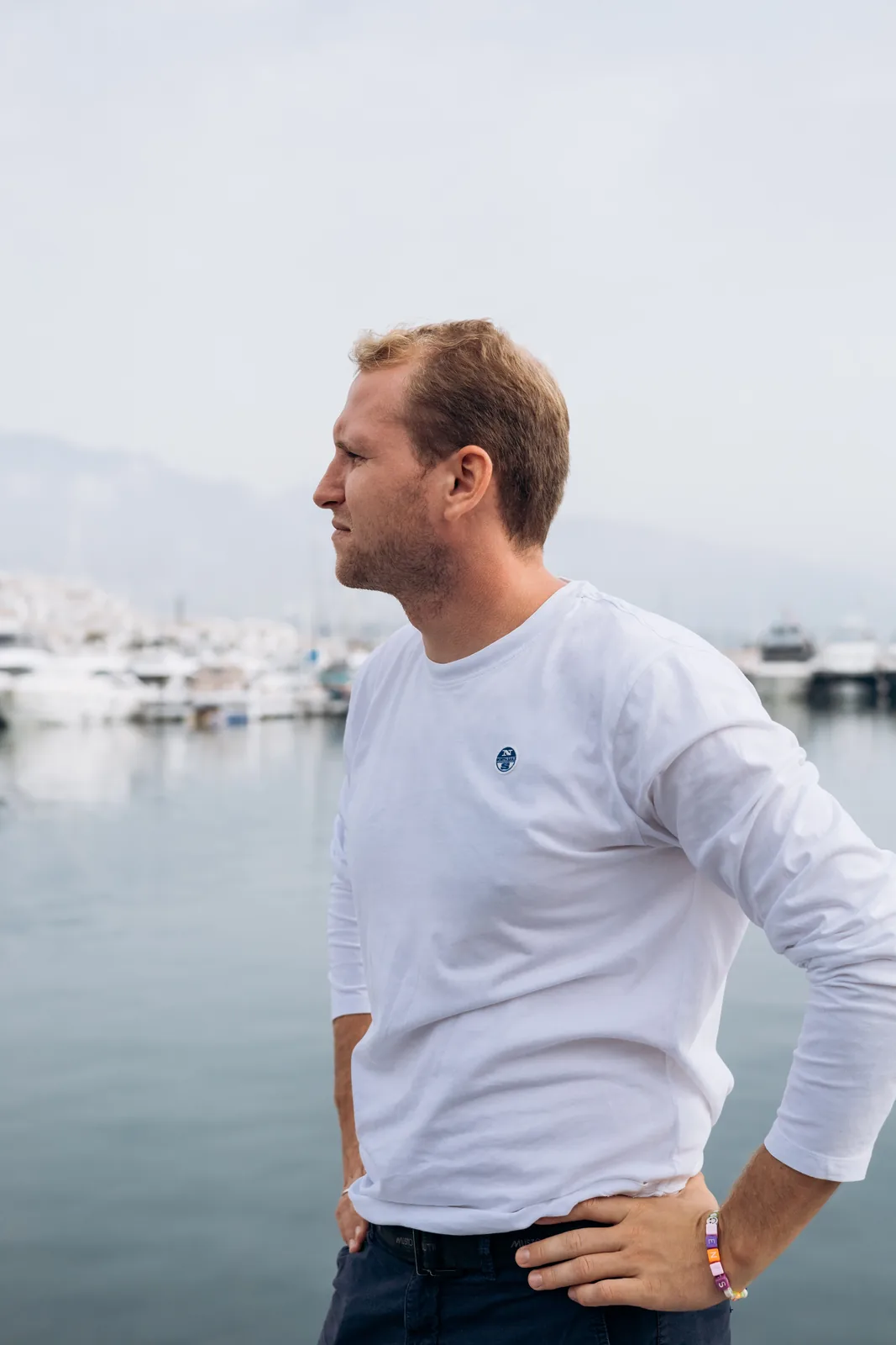Denis Kotlyarov at a marina, representing the LuxTech section.